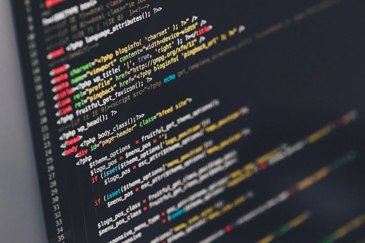Developer writing software code on a workstation